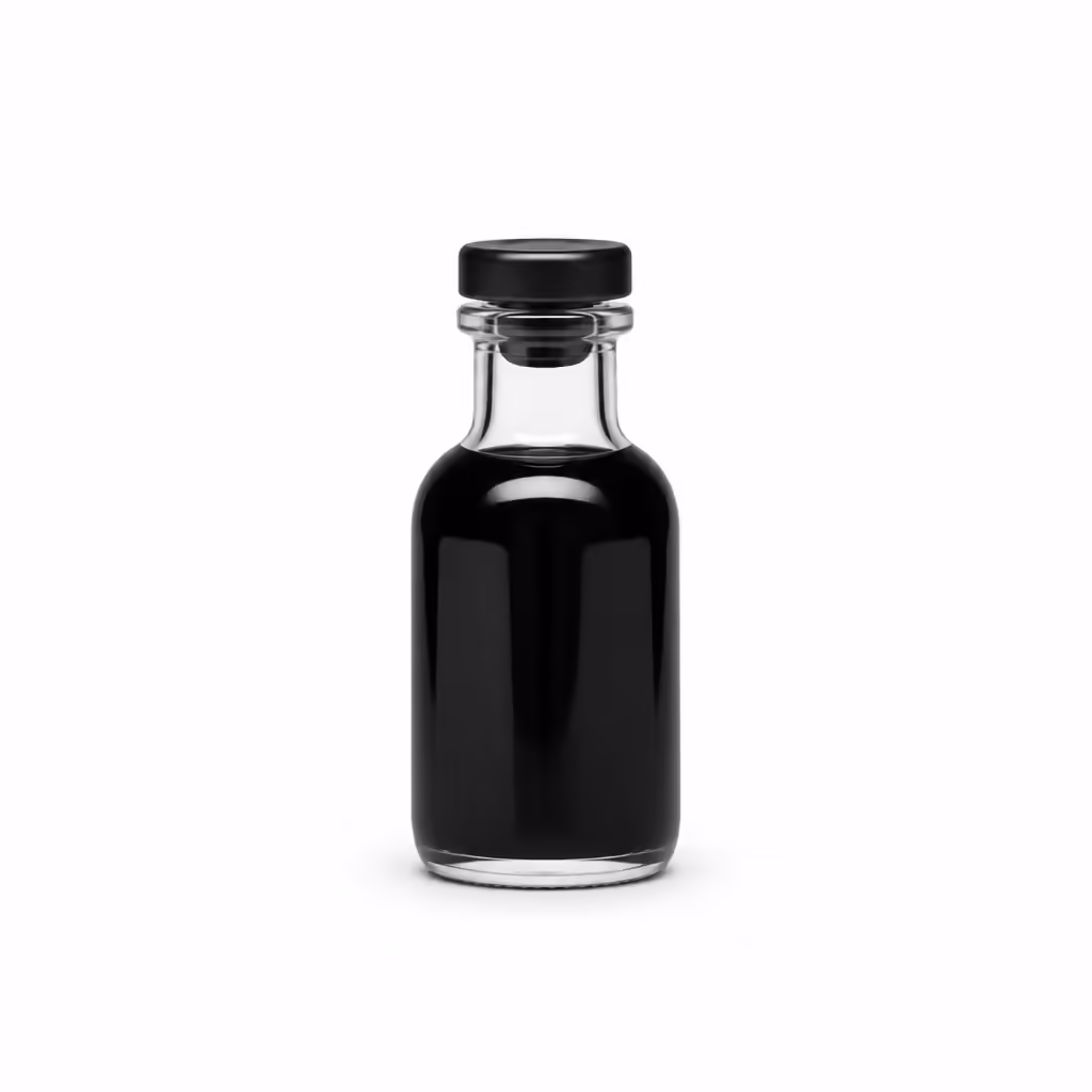Petit flacon en verre rempli d'encre de seiche noire brillante